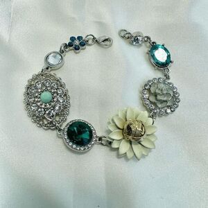 Silver tone flower rhinestone bracelet